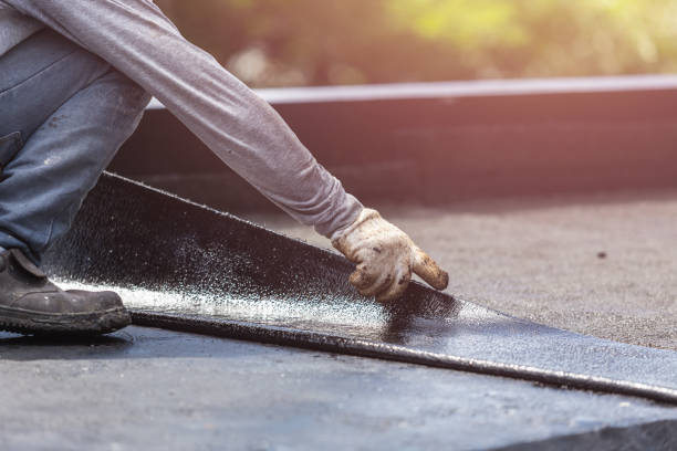 Professional Waterproofing technician working in Viola, IL